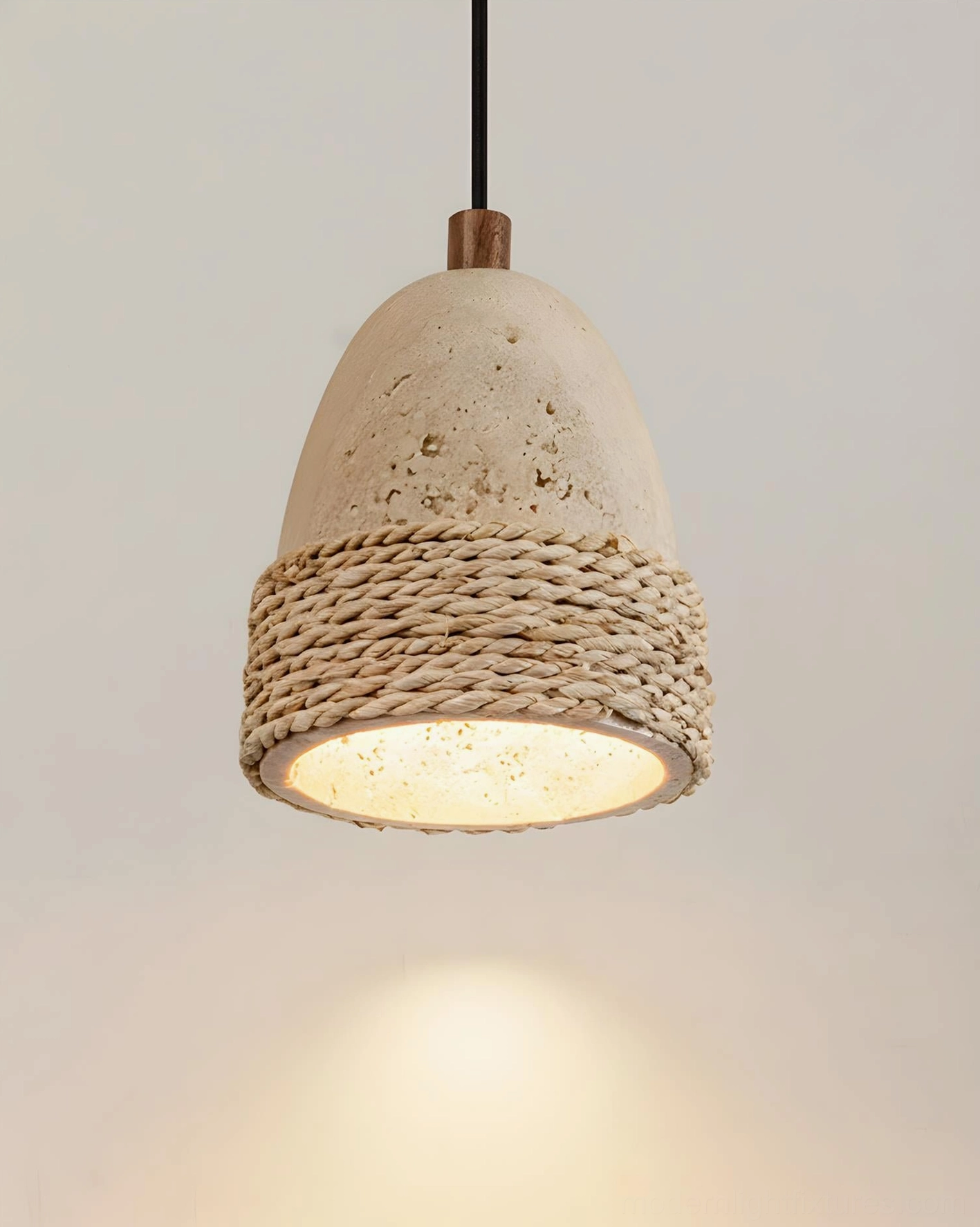 Baskra travertine pendant light demonstrating natural stone surface texture and organic variations