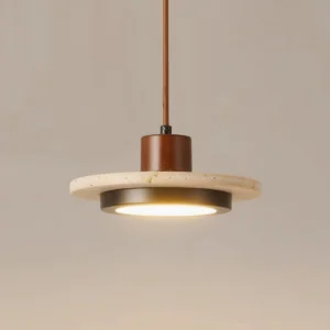 Minimalist disc pendant lamp featuring natural travertine stone and integrated LED warm glow