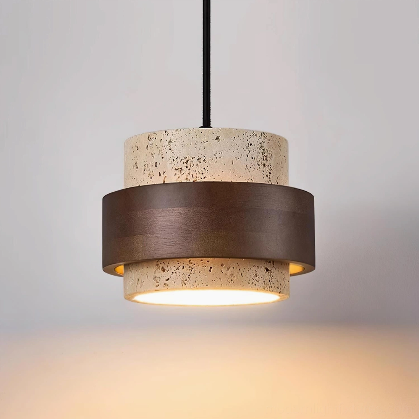Top-down overhead view of travertine pendant lamp showing textured stone surface and wood ring accent