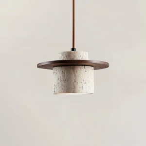 Natural travertine pendant lamp with walnut finish wood cap, side angle view displaying cylindrical stone shade and wood disc design
