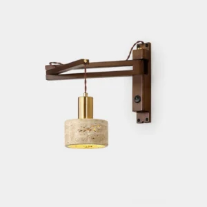 Modern swing arm wall sconce with walnut wood bracket and natural travertine cylinder shade, front studio view showing adjustable arm design