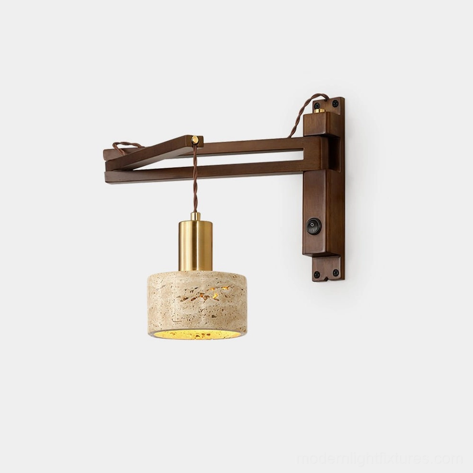 Modern swing arm wall sconce with walnut wood bracket and natural travertine cylinder shade, front studio view showing adjustable arm design