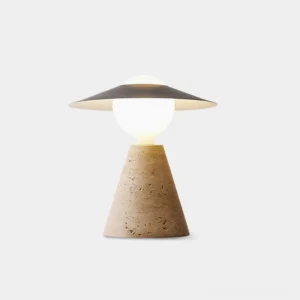 Modern travertine table lamp with black metal shade, front view on white background