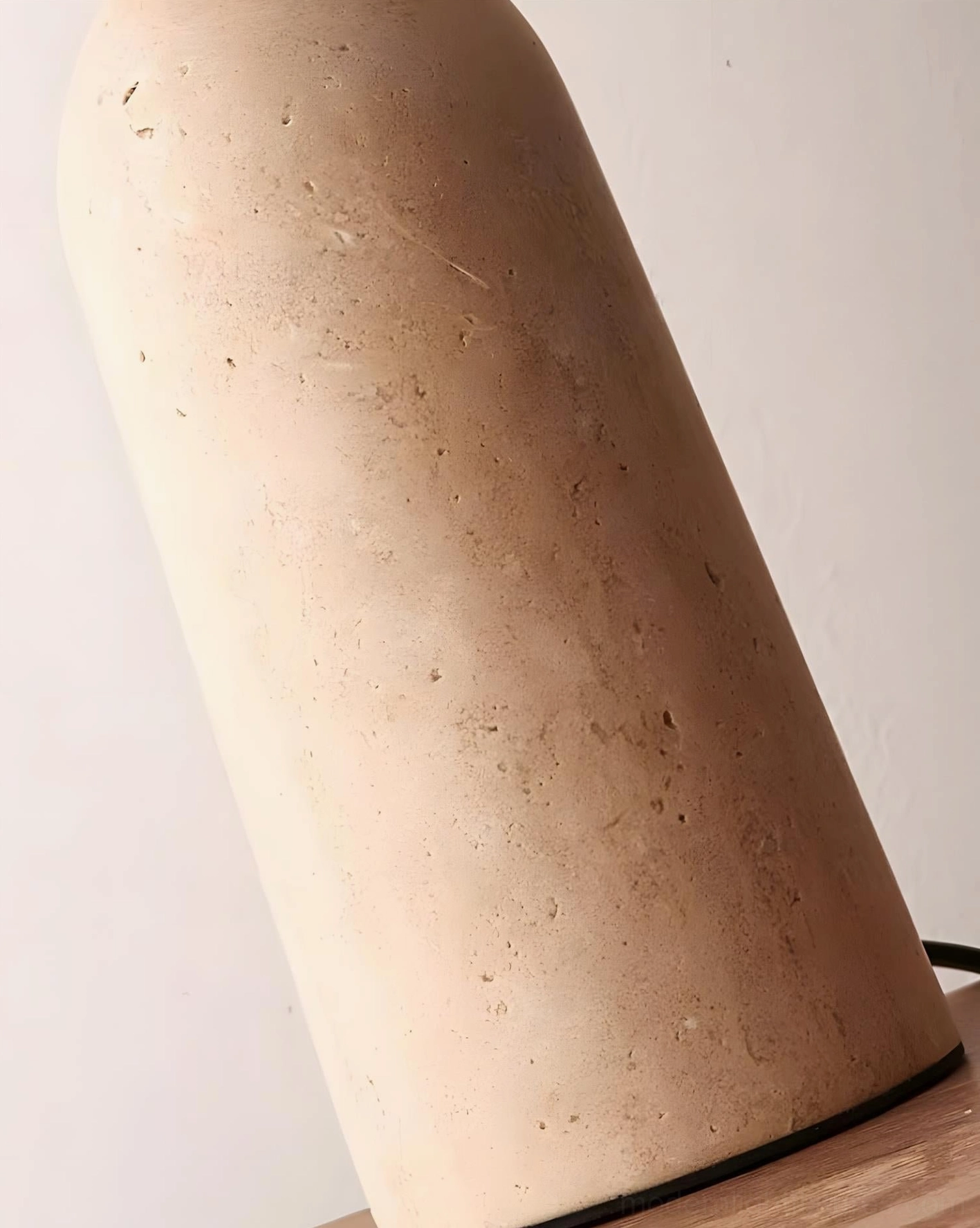 Travertine table lamp showing dome glass shade detail and light diffusion