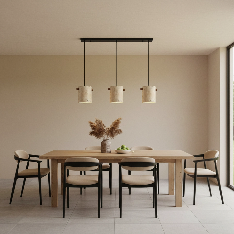 Three-head travertine pendant light in dining room with wooden table, warm neutral home interior ambiance