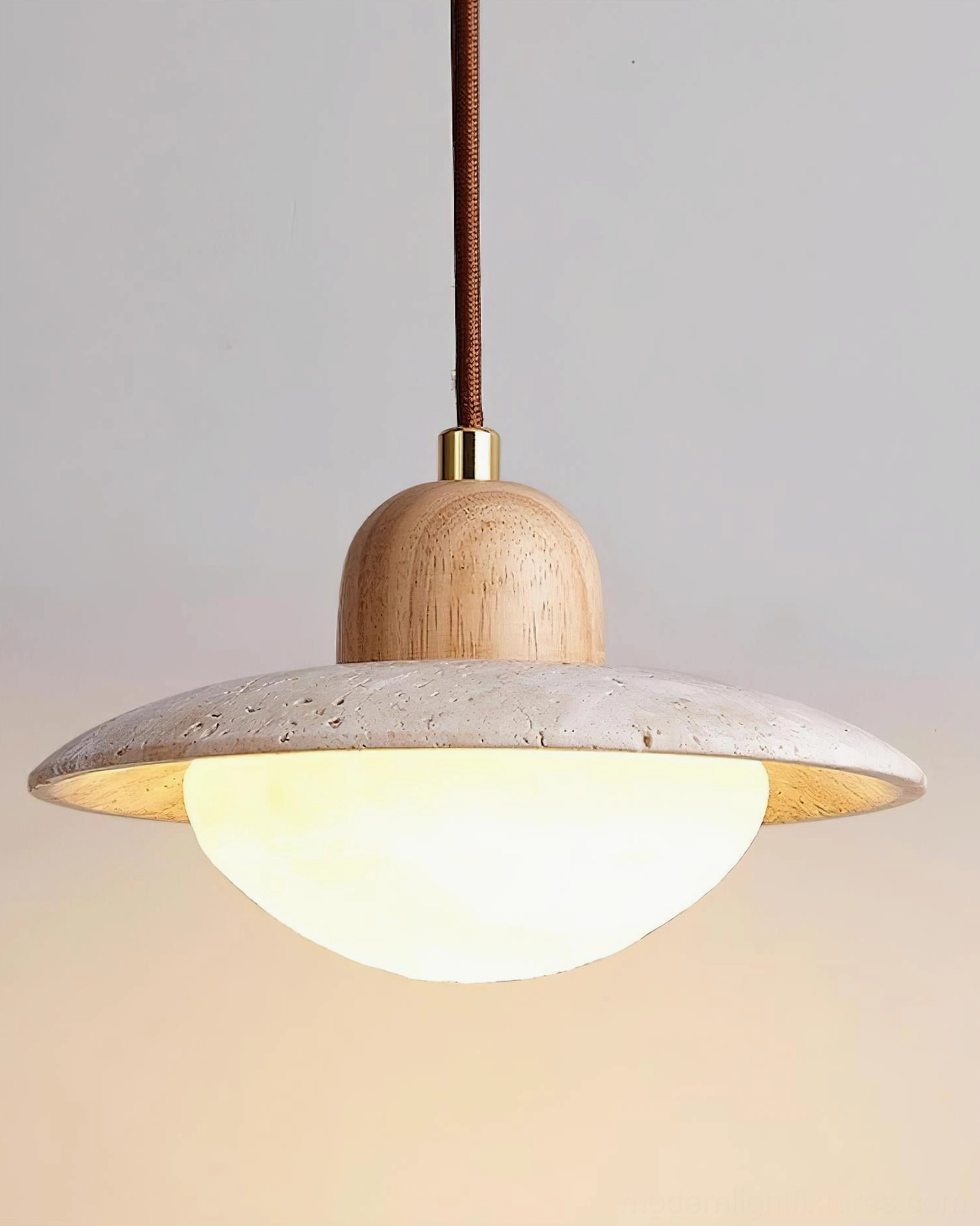 Close-up overhead view travertine UFO pendant light modern japandi design