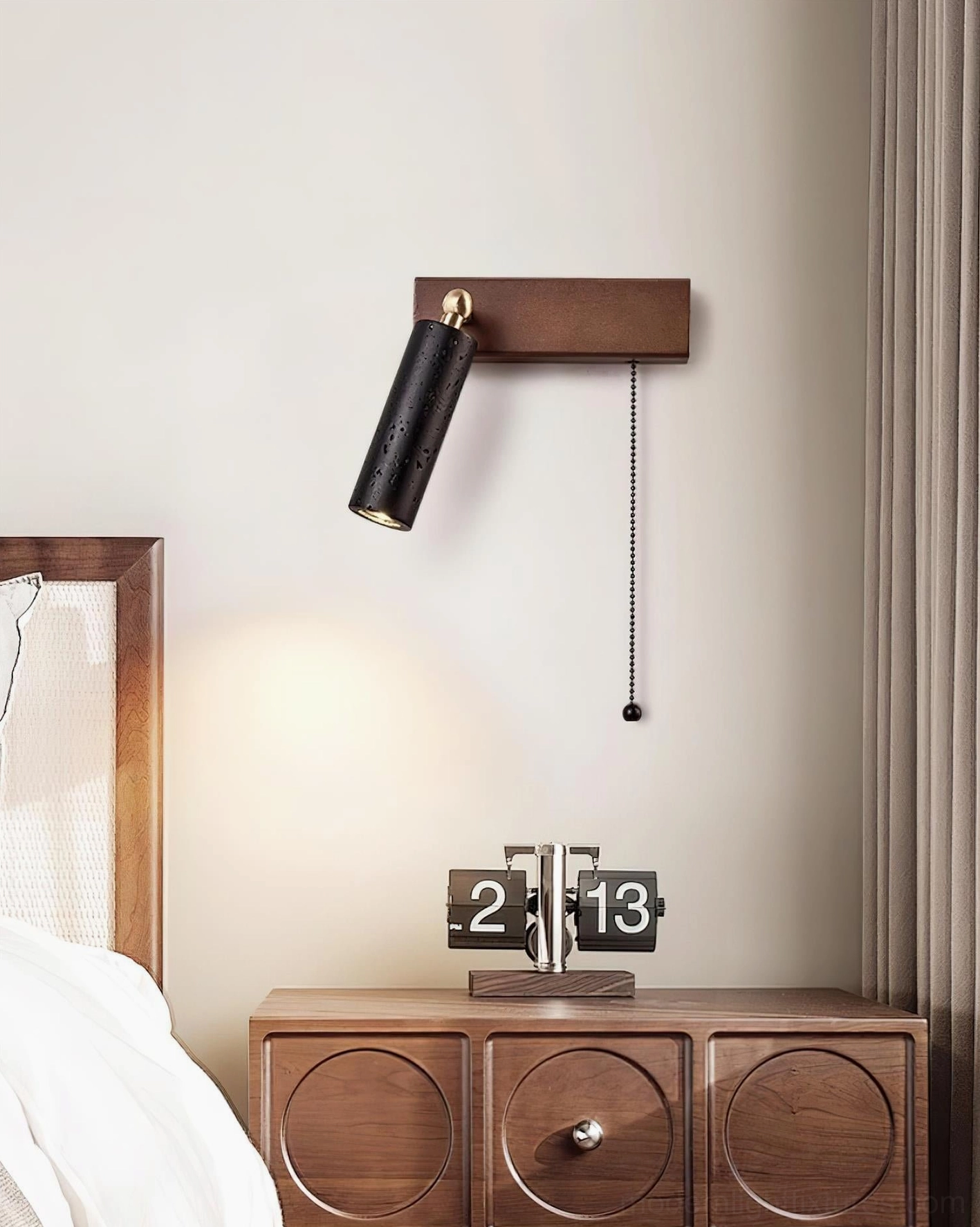 Artisanal travertine wall sconce – contemporary design with natural material imperfections and brass details