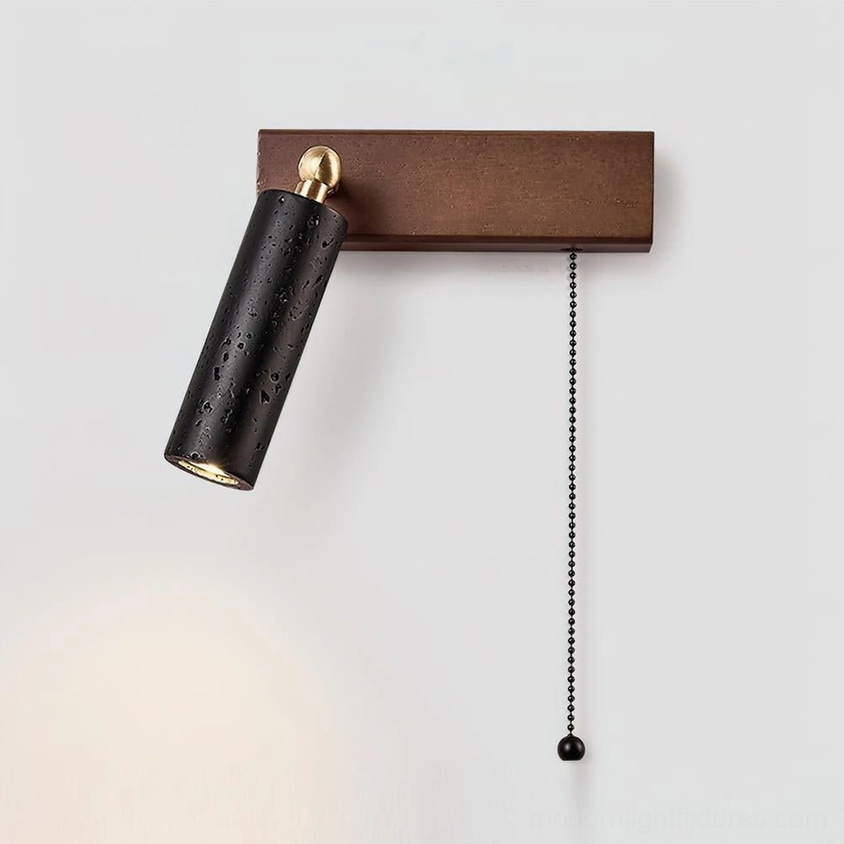 Modern minimalist travertine wall sconce with beige stone shade and brass hardware – left-facing direction
