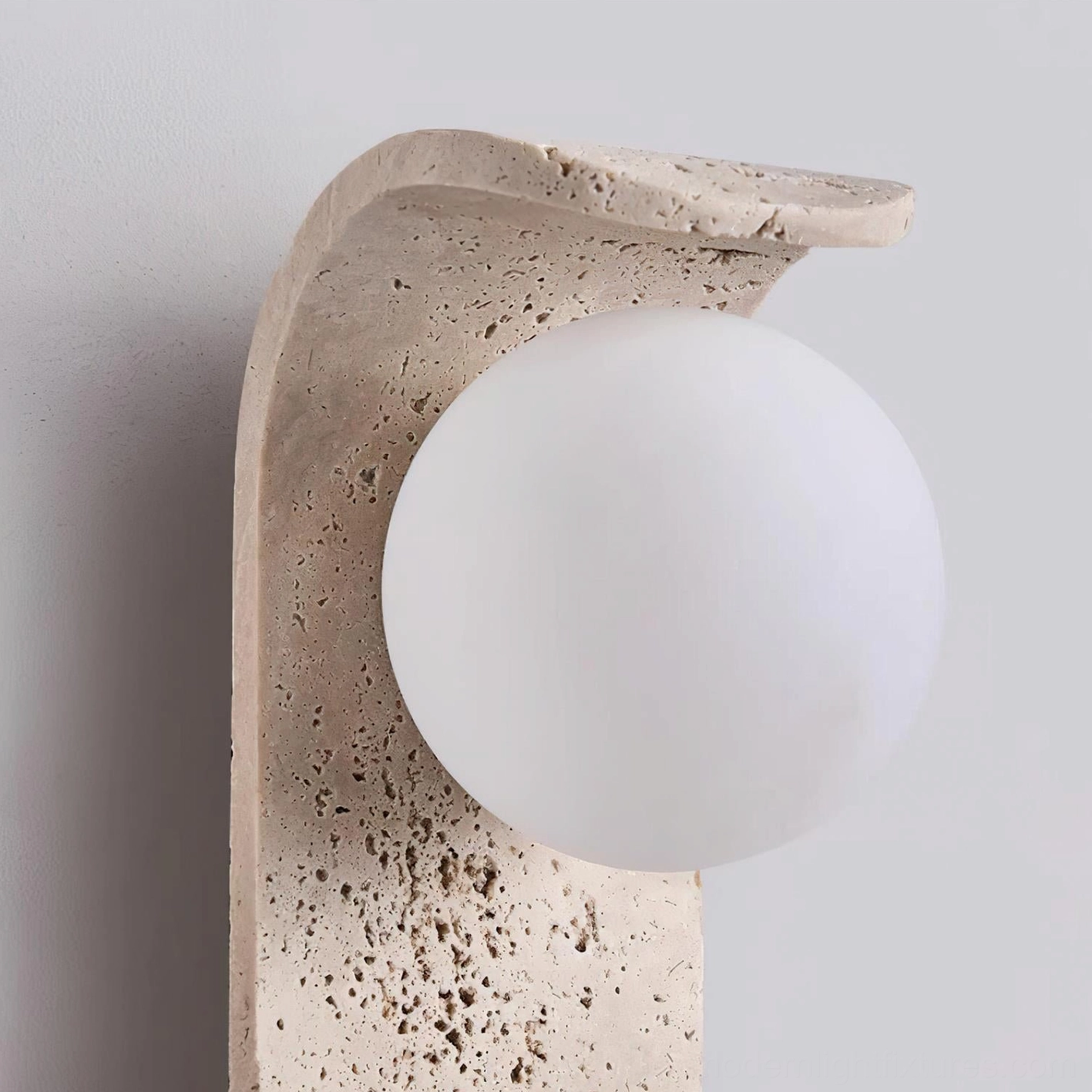 Modern travertine wall lamp - minimalist design combining natural stone with contemporary aesthetics