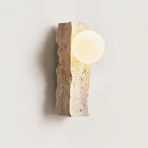 Illuminated travertine wall lamp side angle, beige natural stone base with warm light glow, minimalist design