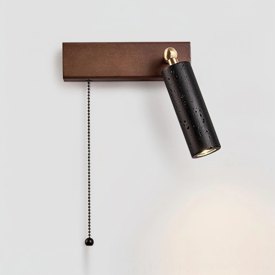 Pull chain travertine wall sconce with black porous stone shade and wooden backplate – studio product photography