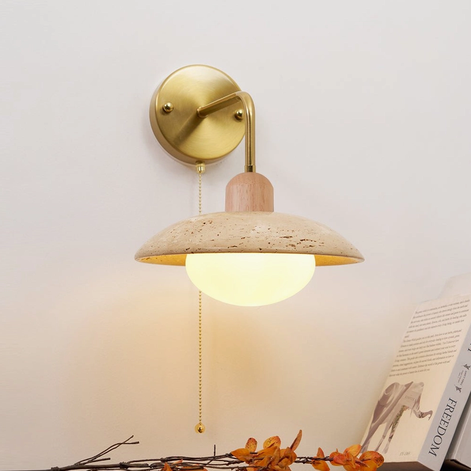 Travertine wall sconce gold and wood color finish variant in neutral room setting