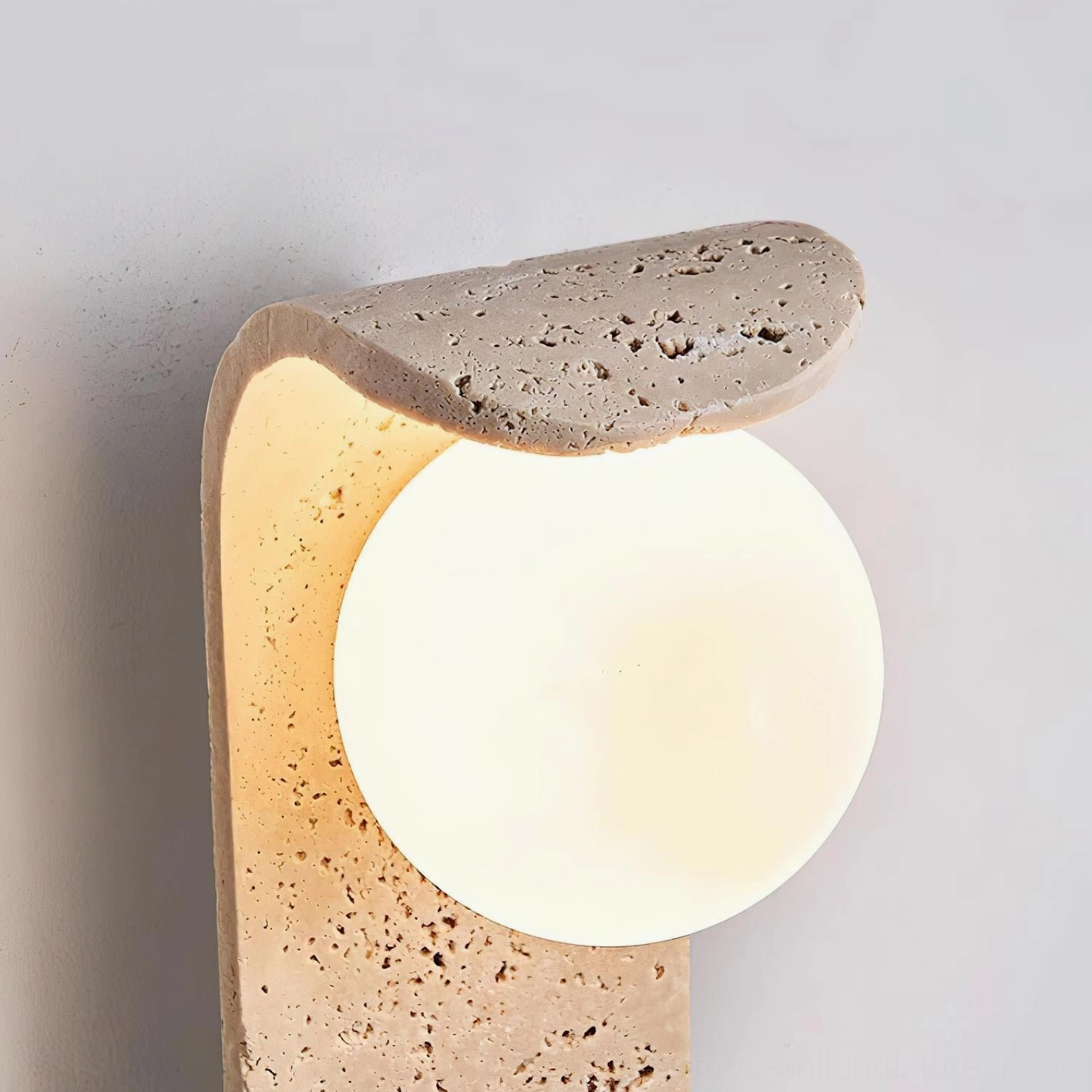 Travertine wall sconce installation - modern home lighting accent for interior design