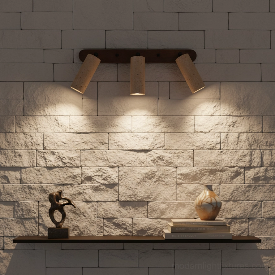 Ricerca travertine wall sconce paired with natural stone and wood elements in Nordic design setting