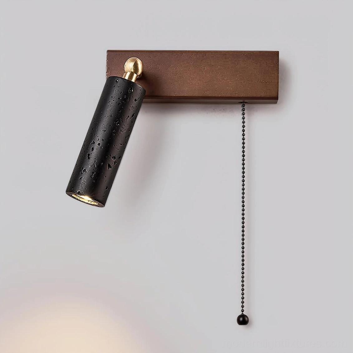 Minimalist travertine wall lamp with porous stone shade – organic texture modern home lighting solution