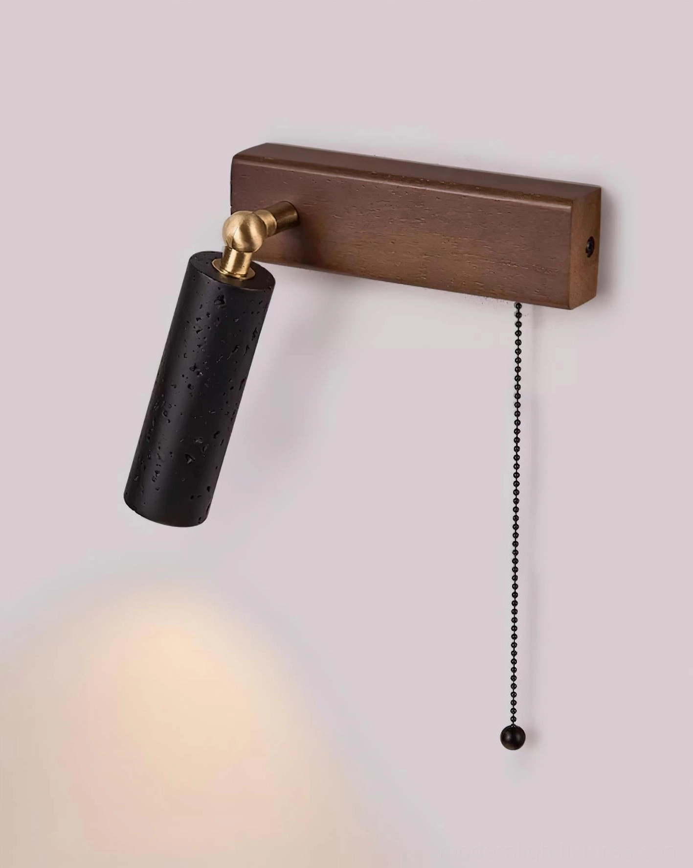 Travertine wall sconce with walnut wood backplate and travertine stone shade – Japandi design aesthetic