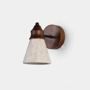 Travertine wall sconce with walnut wood backplate and conical stone shade, front studio view