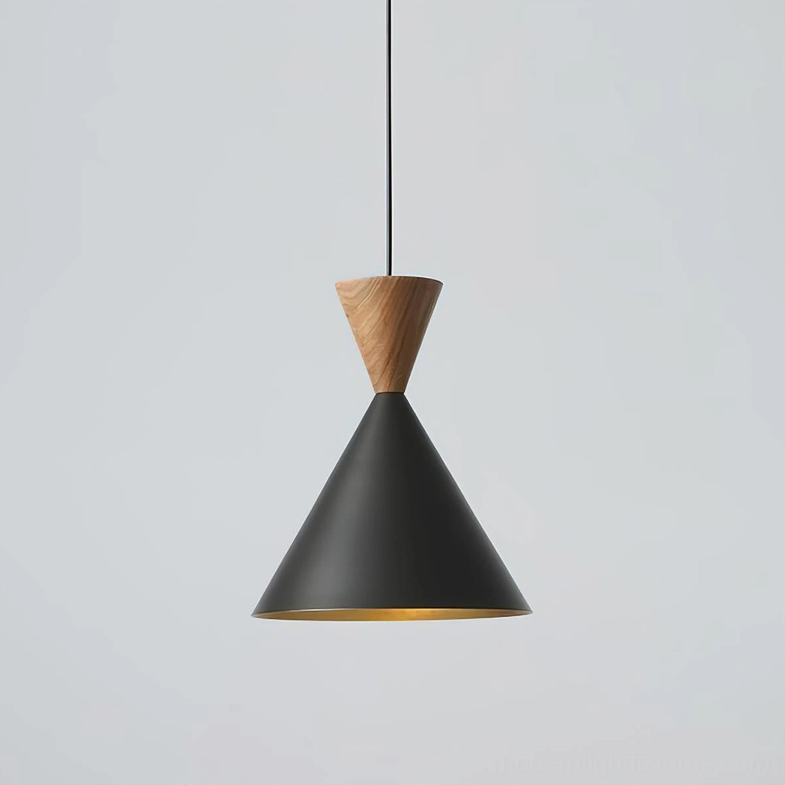 Trevio conical pendant fixture front three-quarter studio view, black exterior gold interior brass shade with natural wood crown detail