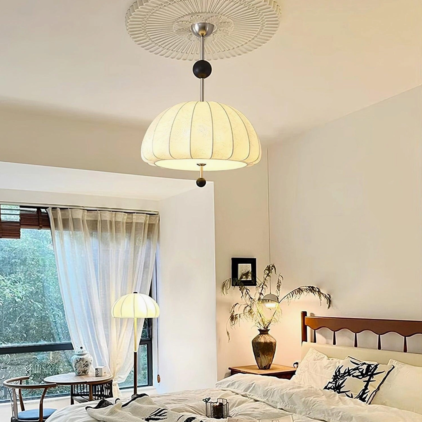 Trigg fabric dome pendant light in vintage bedroom setting with warm neutral color palette and traditional home decor styling