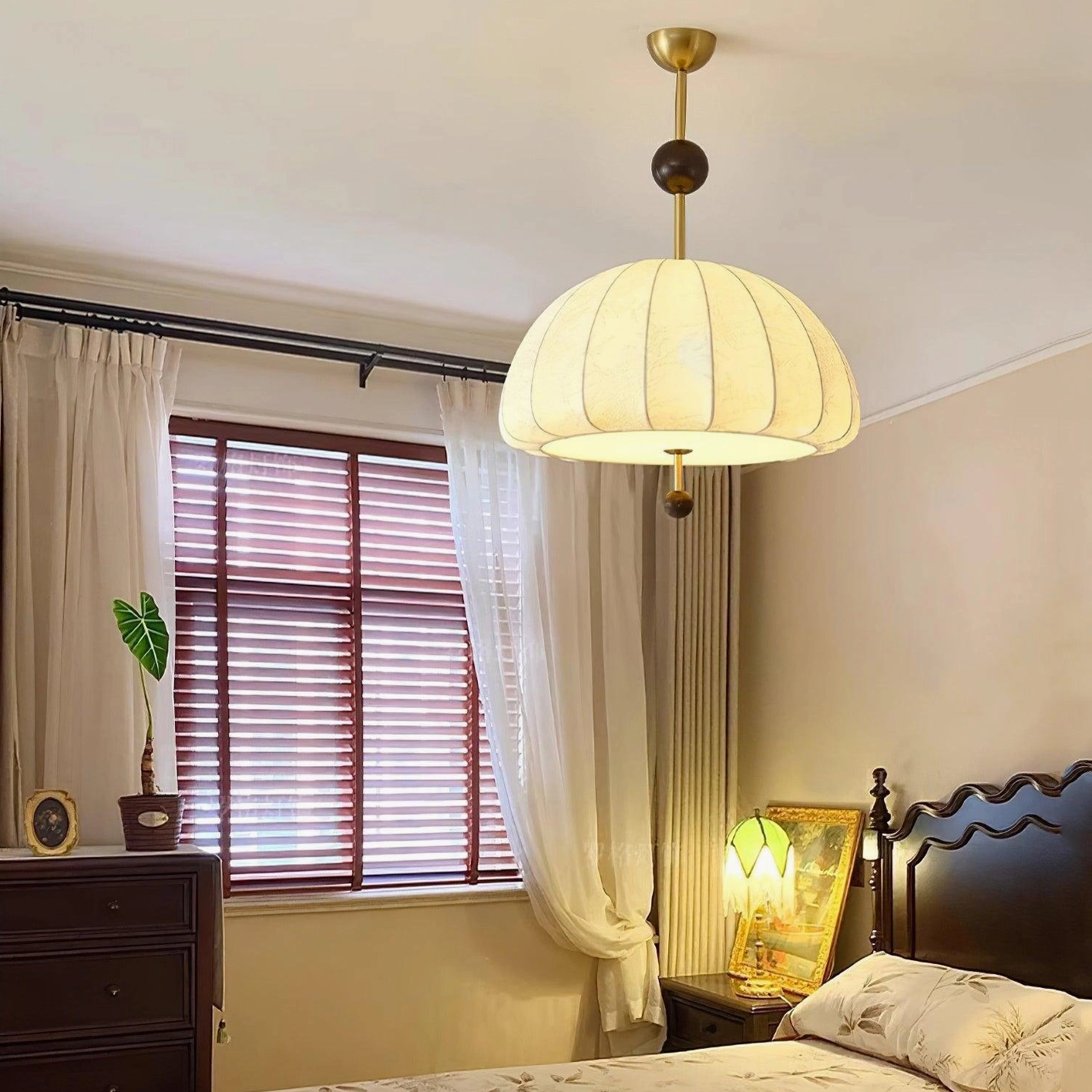 Trigg fabric dome pendant light in vintage bedroom with window blinds warm neutral color palette and nostalgic home styling