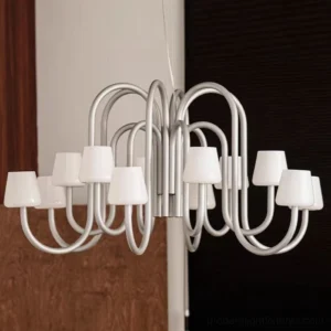 Contemporary Trilo chandelier with brushed silver metal frame and white tapered lamp shades - eye-level interior view