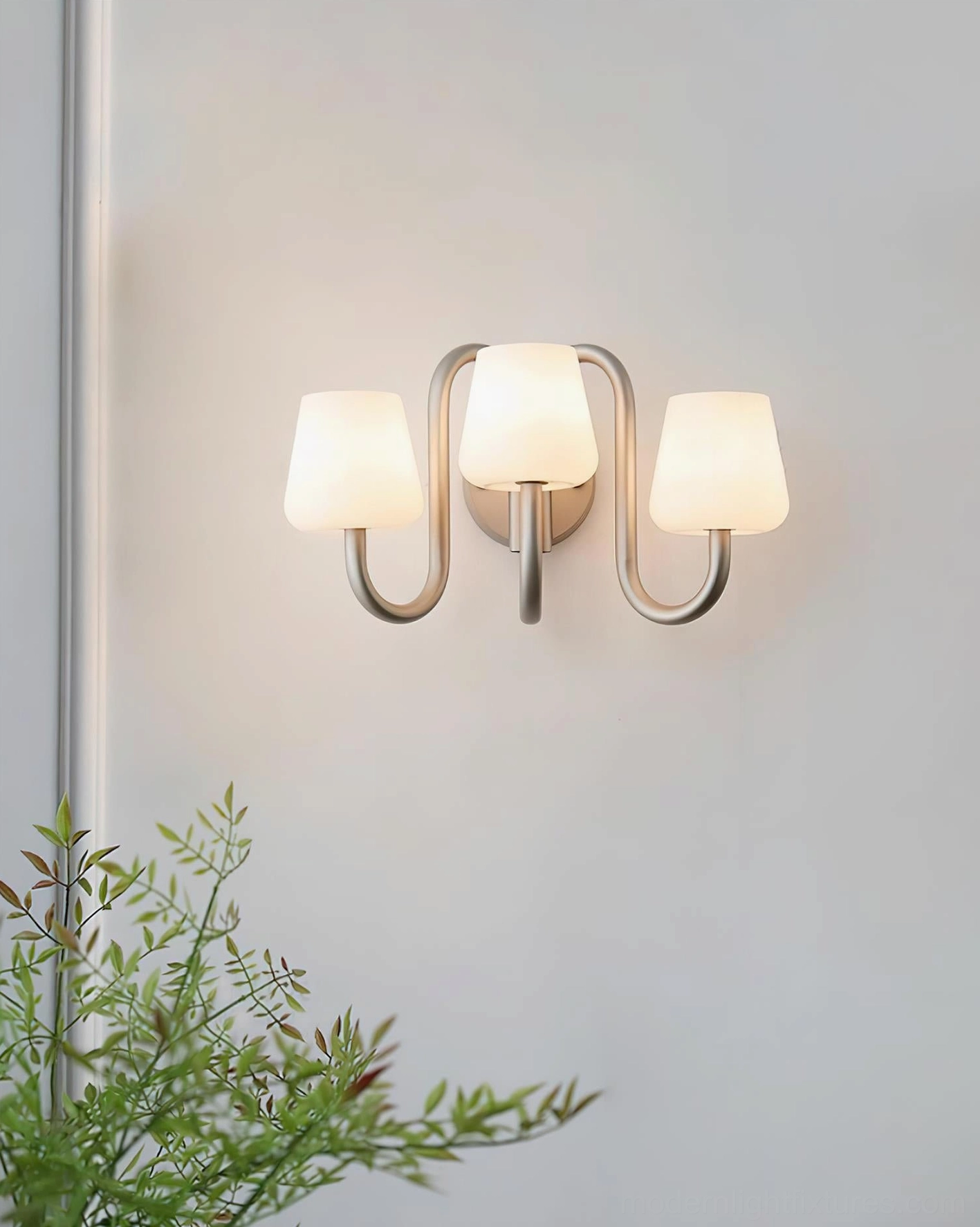 Trilo wall sconce damp-rated fixture suitable for bathrooms and transitional interiors