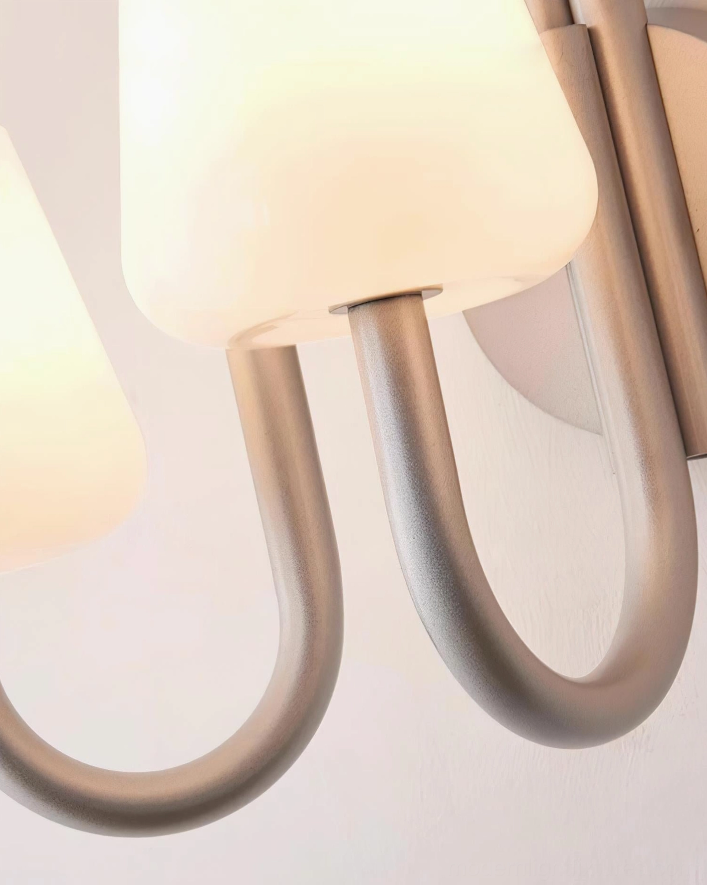 Trilo 3-light wall lamp mid-century modern inspired curved arm sconce