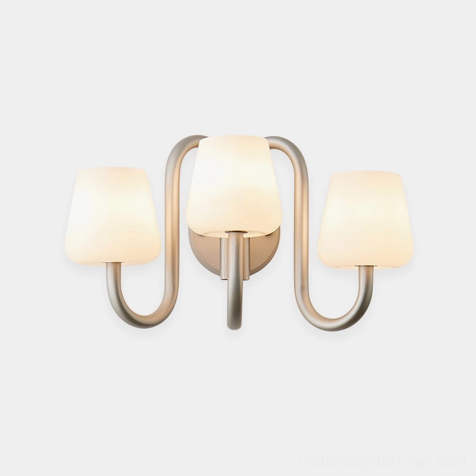 Trilo modern wall sconce minimalist design with curved arms and milky frosted glass shades