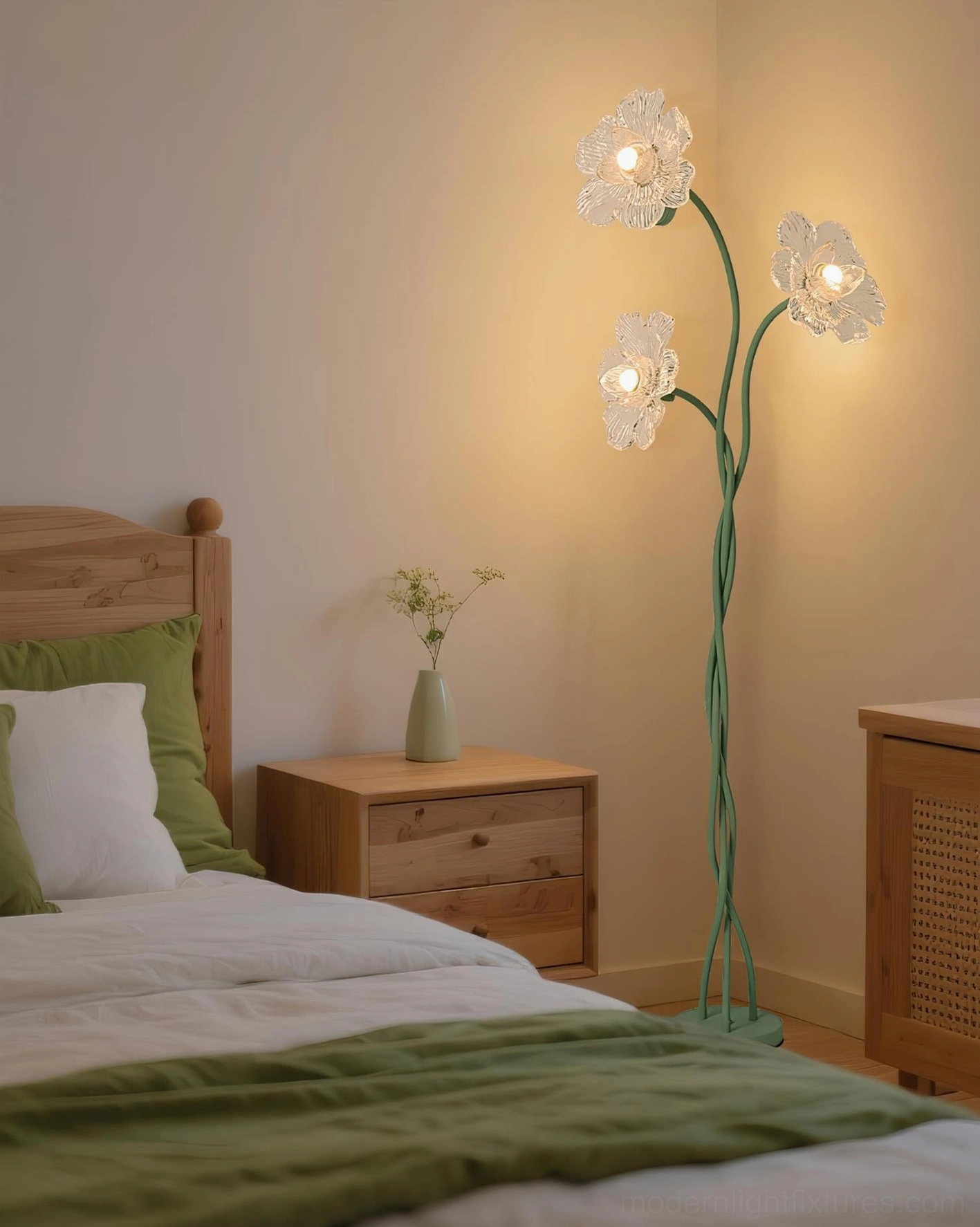 Modern floral floor lamp in rustic cottage bedroom with green bedding and wooden furniture