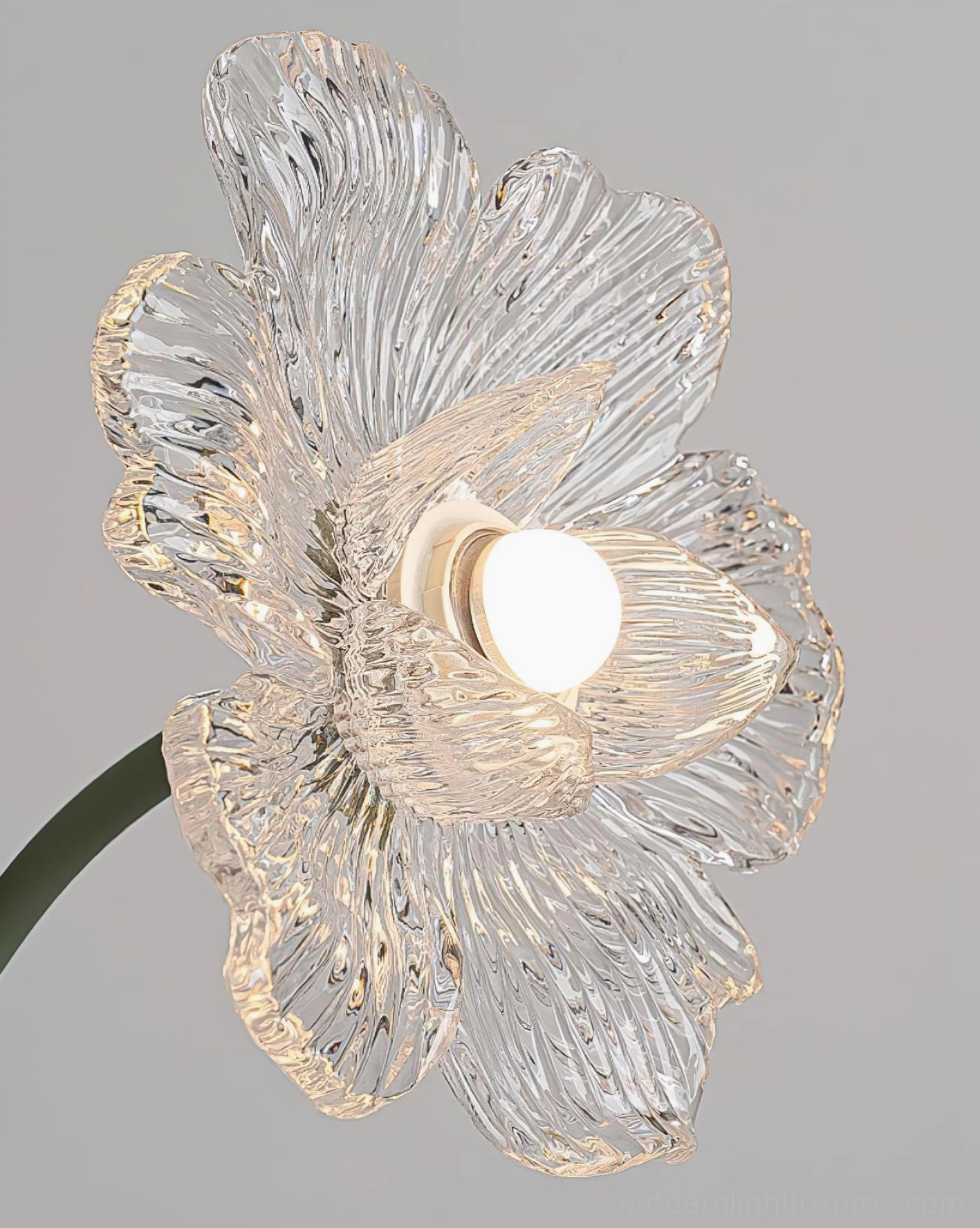 Triluna floral floor lamp with warm 3000K LED illumination in bedroom setting with green bedding
