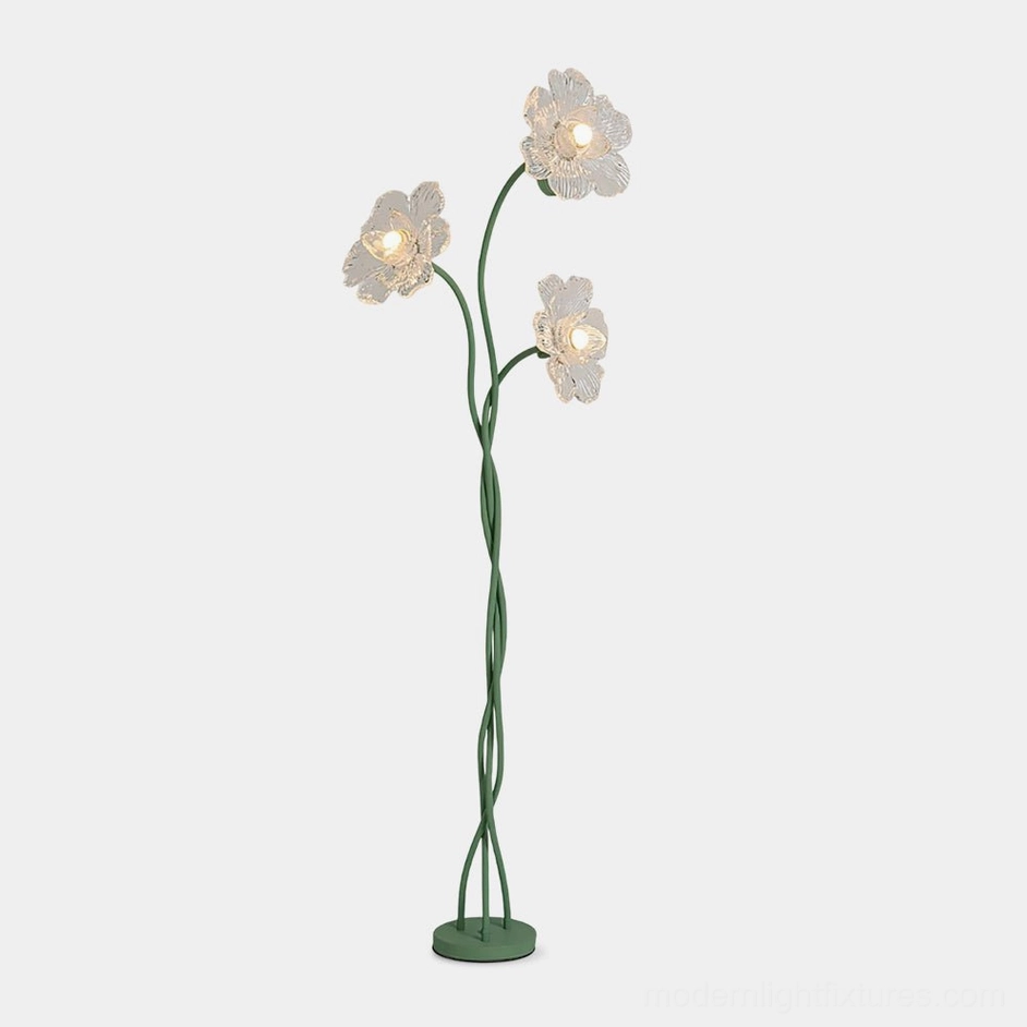 Triluna botanical floor lamp with three floral glass shades on twisted green metal stems, front studio view