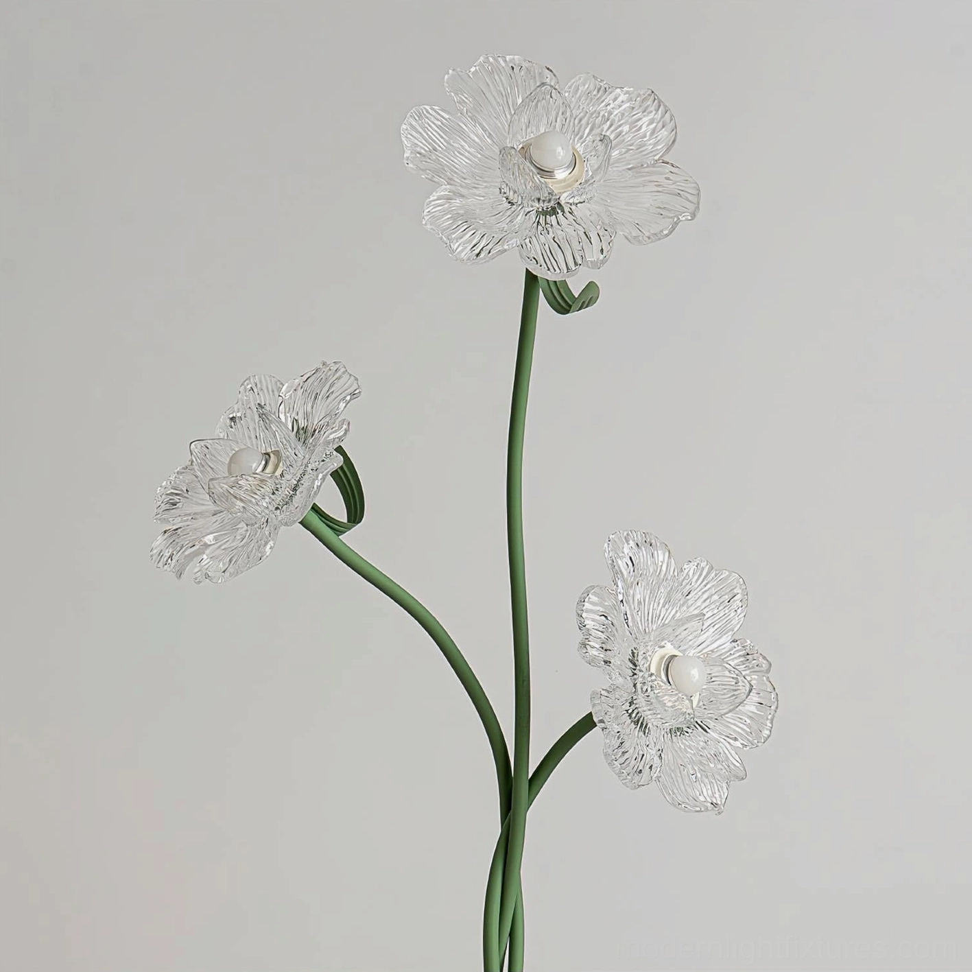 Contemporary botanical floor lamp with transparent glass flower shades and twisted metal frame