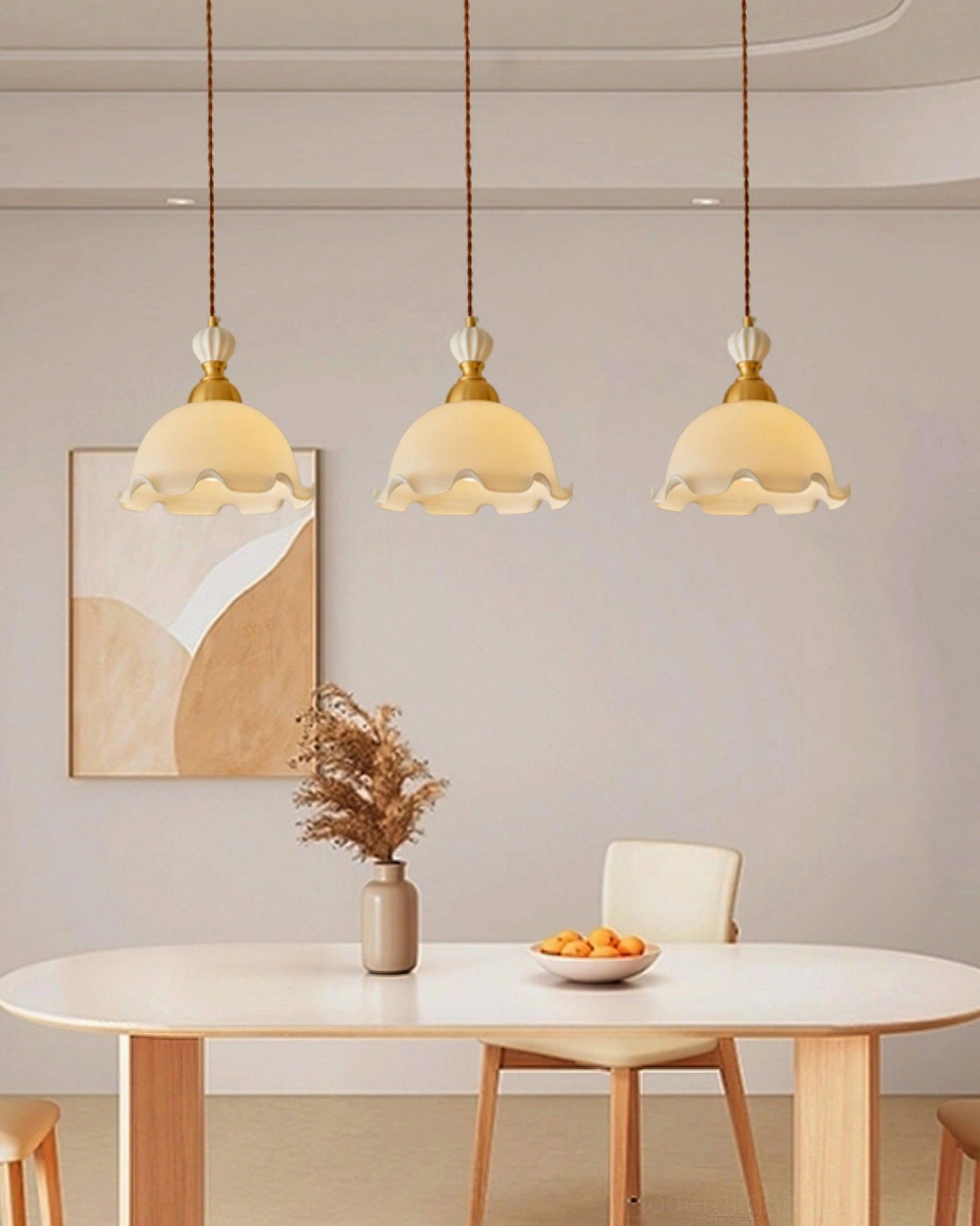 Triple Bianca pendant lights in minimalist dining room, coordinated retro fixtures over table, neutral decor