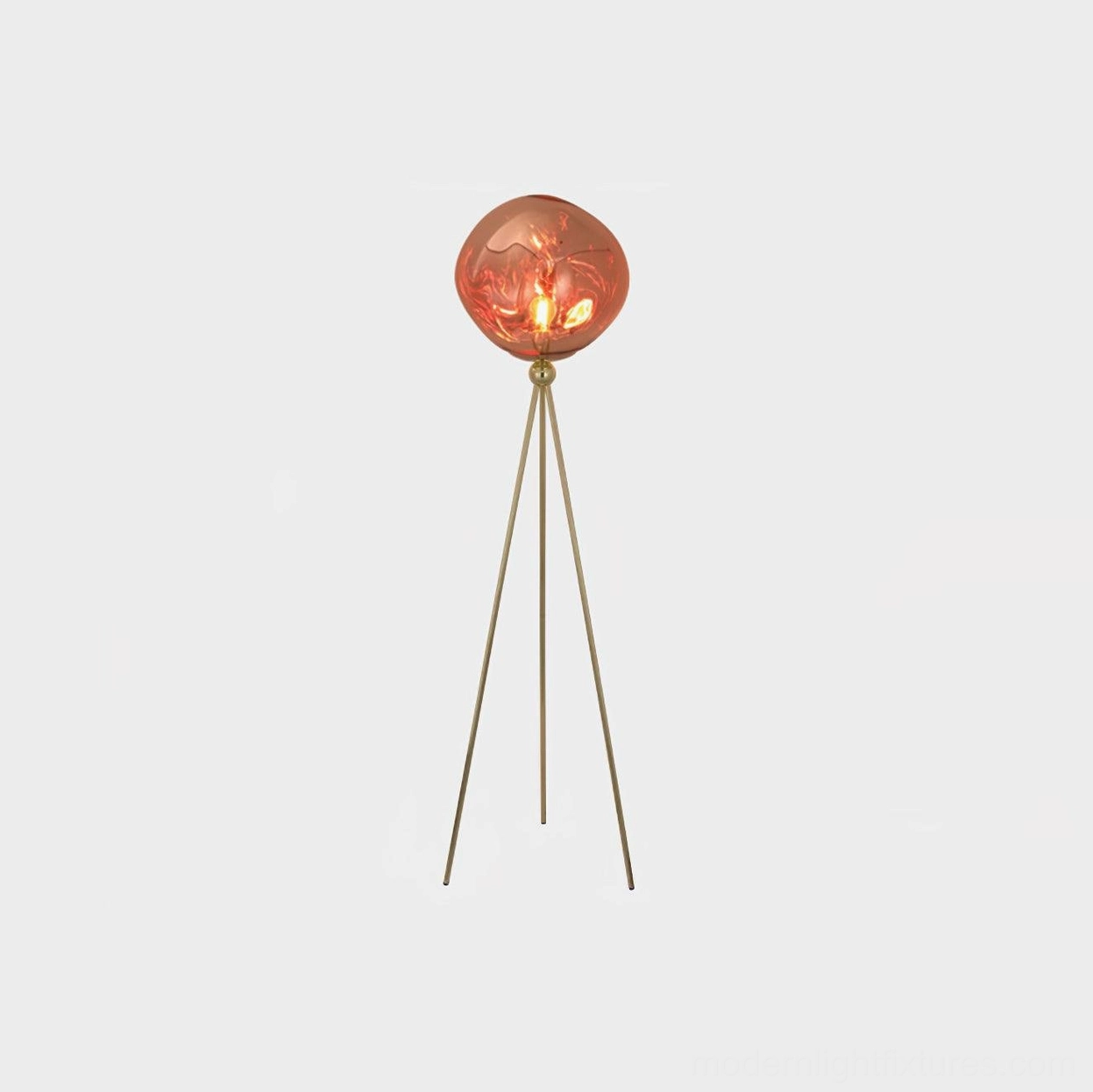 Contemporary tripod floor lamp showcasing unique molten glass texture and warm ambient lighting capability