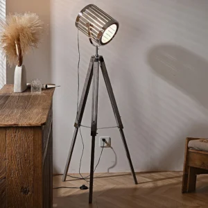 Modern tripod floor lamp side profile displaying dark wood tripod legs and silver metal slatted shade