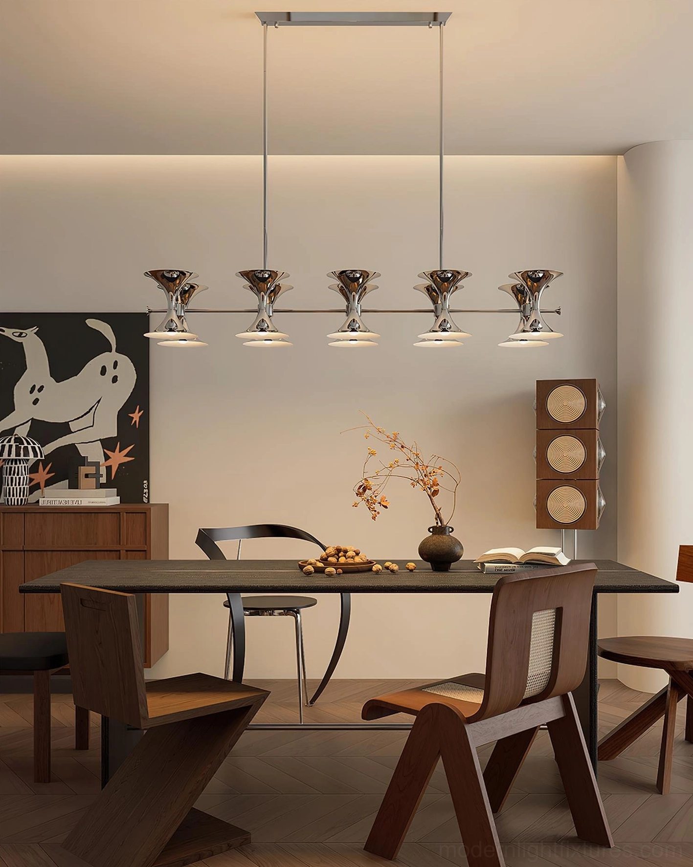 Modern chrome linear pendant light in residential dining room with warm tones and wooden furniture