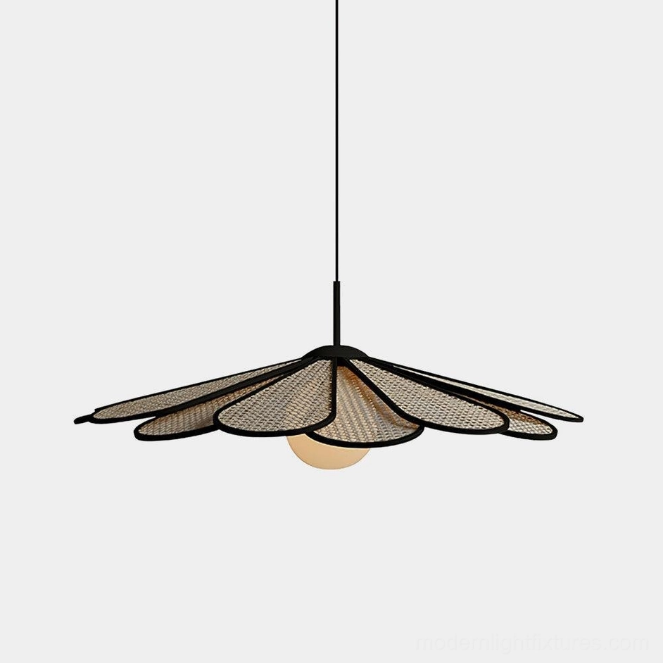 Tropicana rattan pendant light with black-trimmed flower-petal shade shown from overhead view in studio lighting