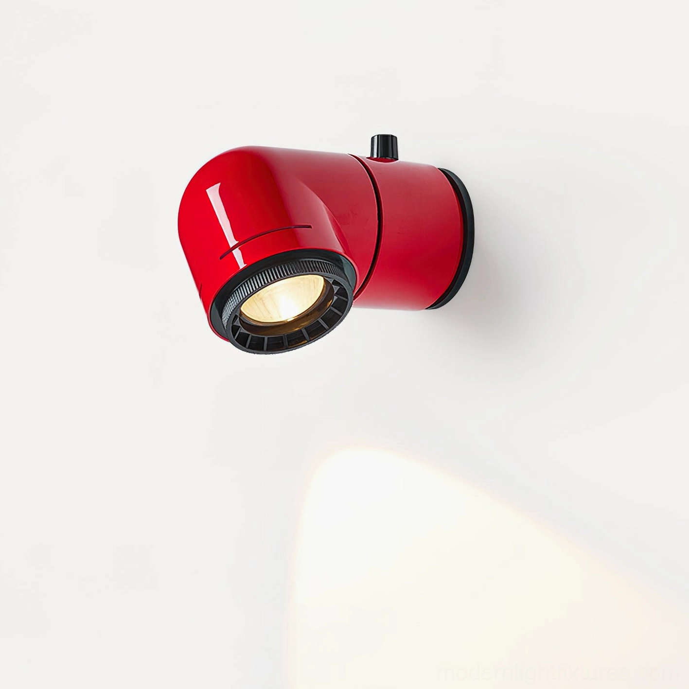 Modern tubular spotlight fixture right side close-up with illuminated warm white LED head