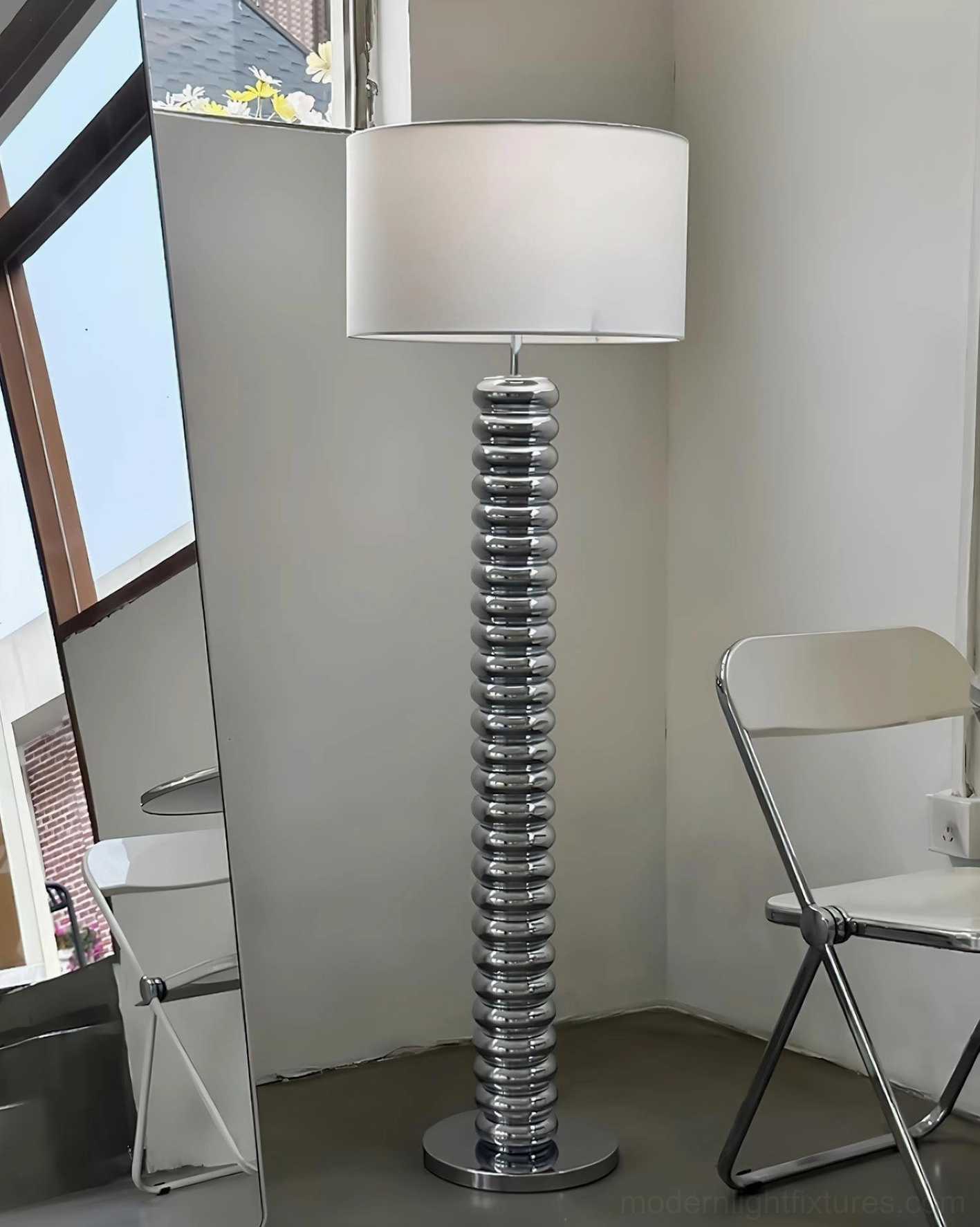 Tula Twist ribbed modern floor lamp detail showing sculptural wood pole construction and metal base craftsmanship