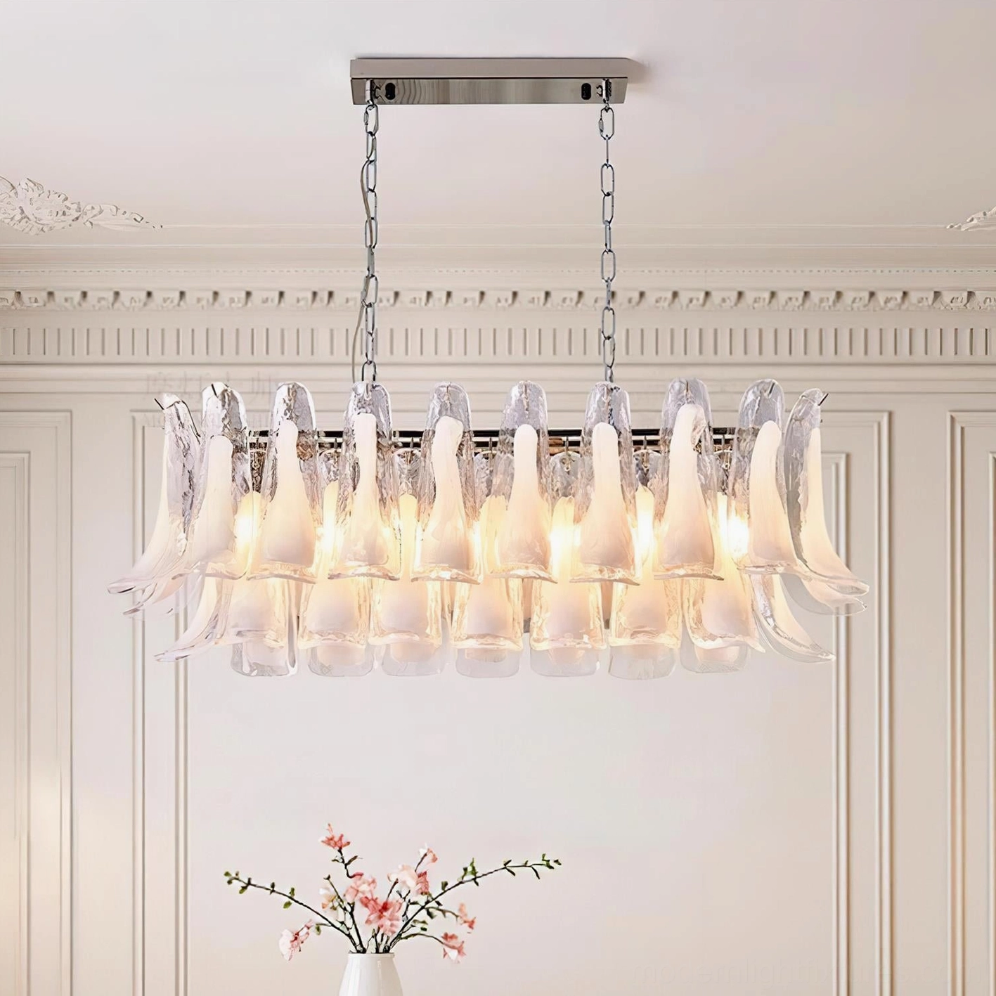 Tulip leaf chandelier in contemporary foyer creating dramatic architectural entry statement