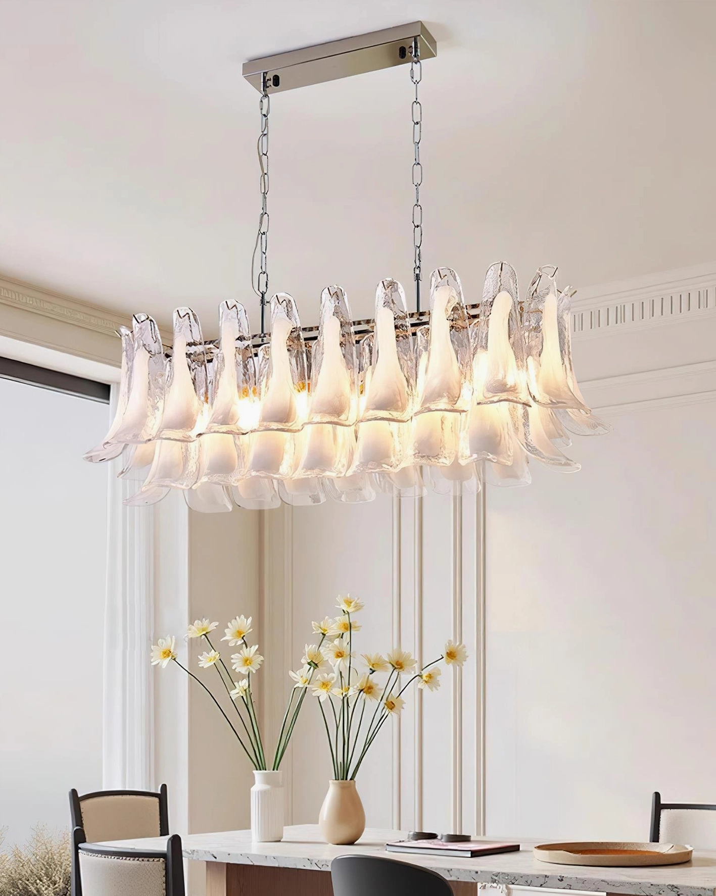 Modern tulip leaf chandelier installation showing adjustable hanging chain in contemporary space