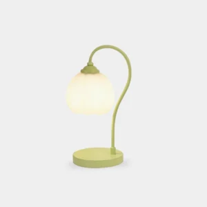Mint green tulip-shaped table lamp with ribbed milk glass shade on white background, front-side angle view