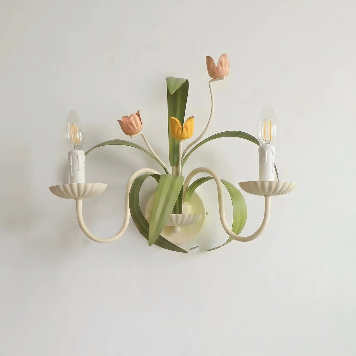 Dual head tulip wall sconce in green and white - side profile showing sculptured stem structure and floral arrangement