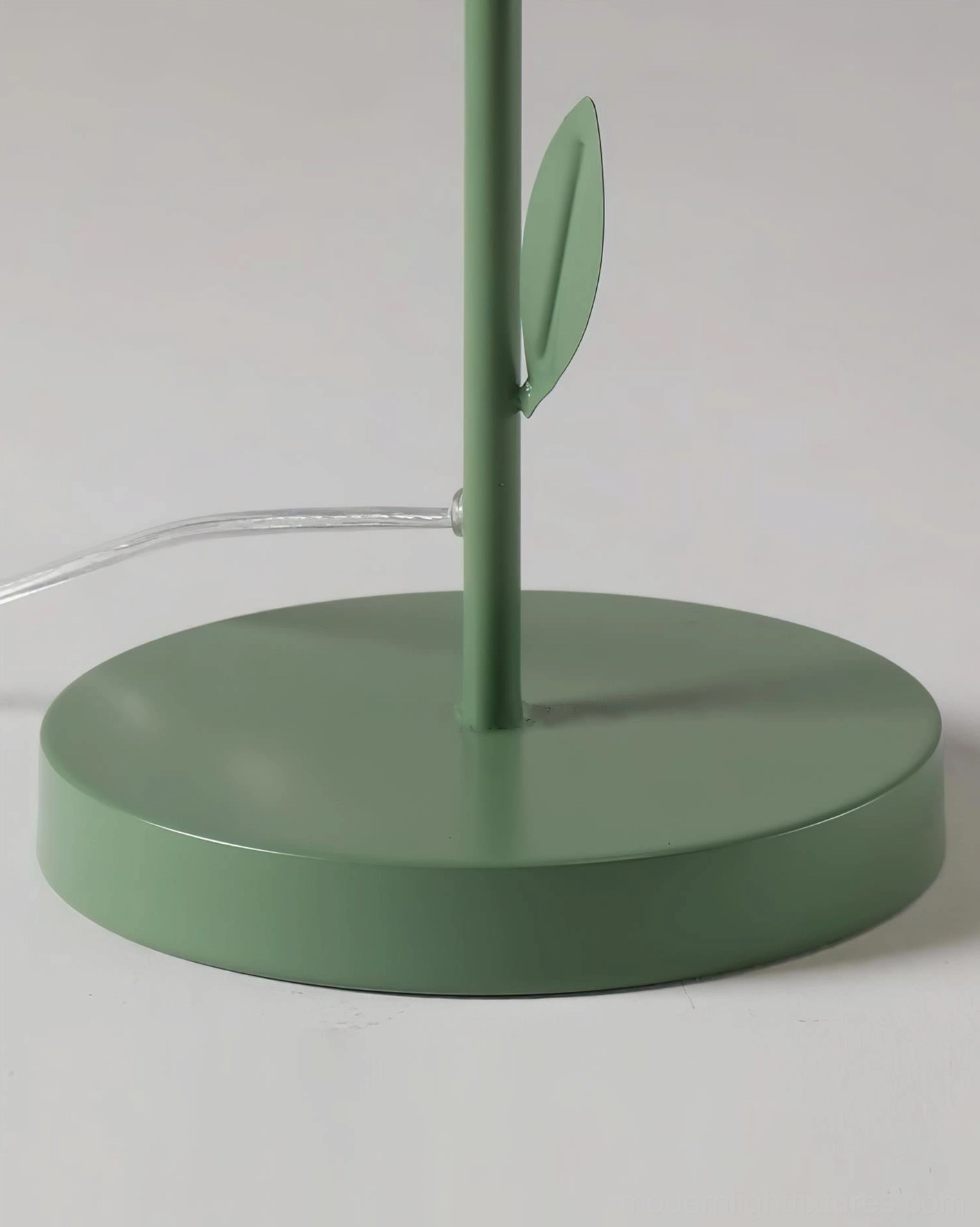 Tulira flower floor lamp side profile showcasing elongated silhouette and petal shade construction, modern statement lighting