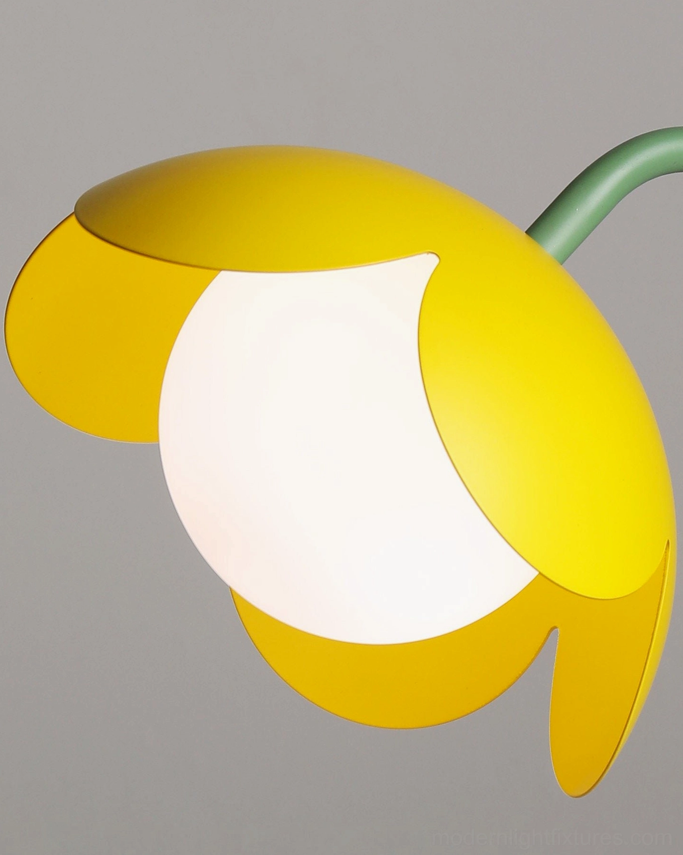 Tulira sculptural floor lamp side three-quarter view, botanical design with metal stem and delicate petal light shades