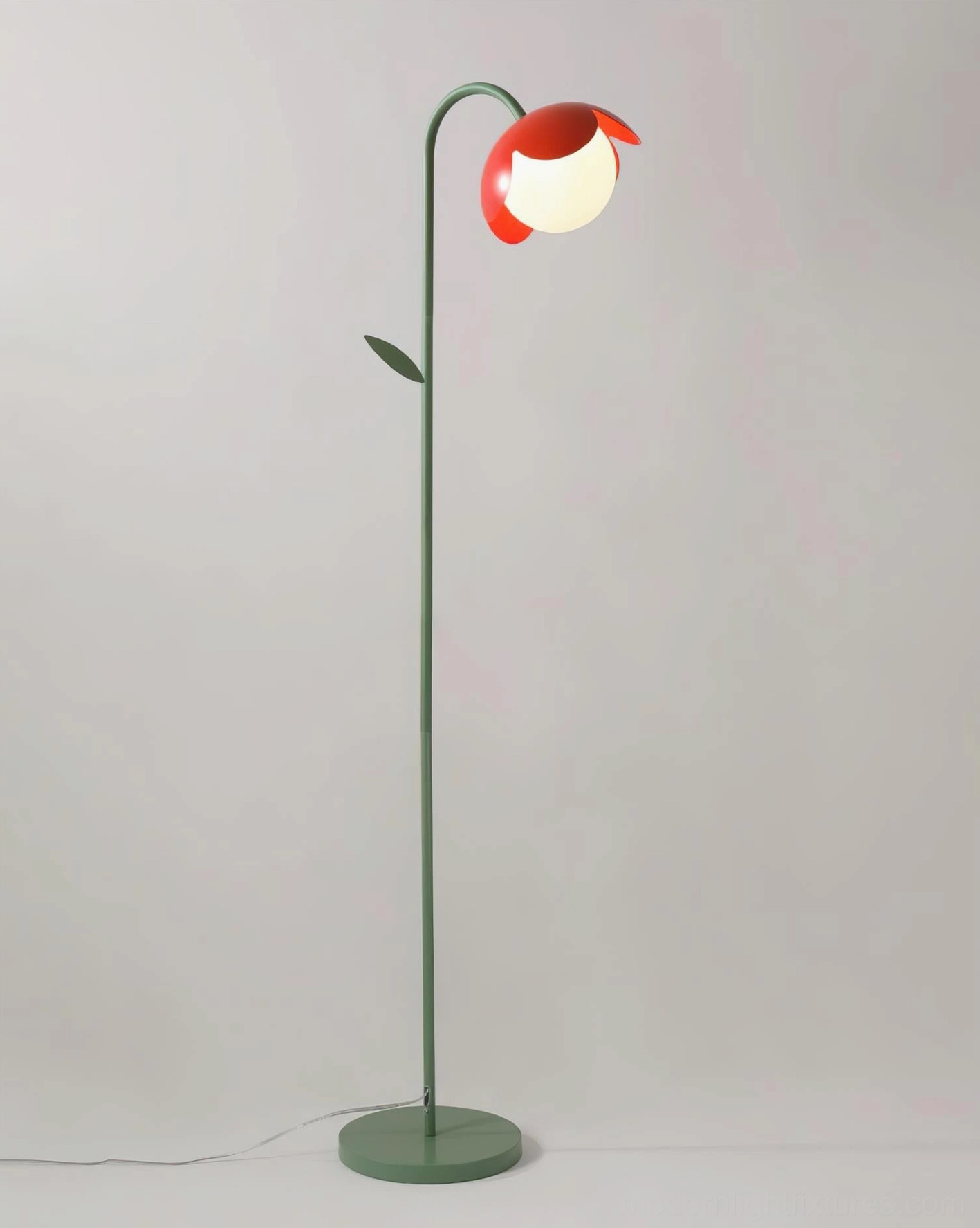 Tulira sculptural floor lamp front view studio shot, matte green metal stem with red tulip-like petal light shades