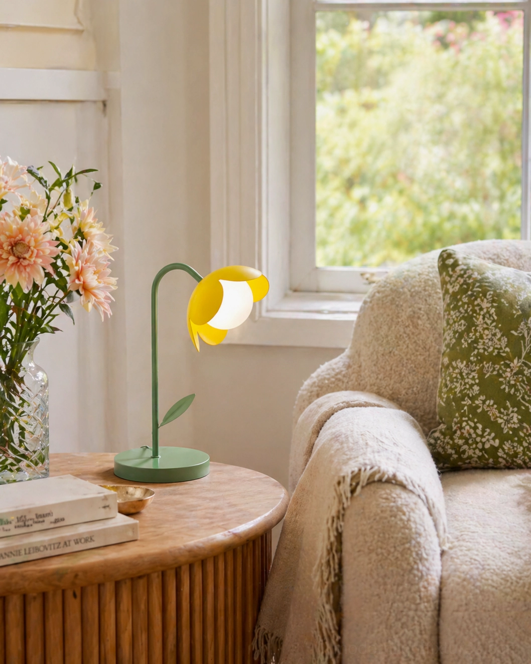 Yellow tulip table lamp with vibrant petal shade and green metal base on side table - contemporary flower desk light
