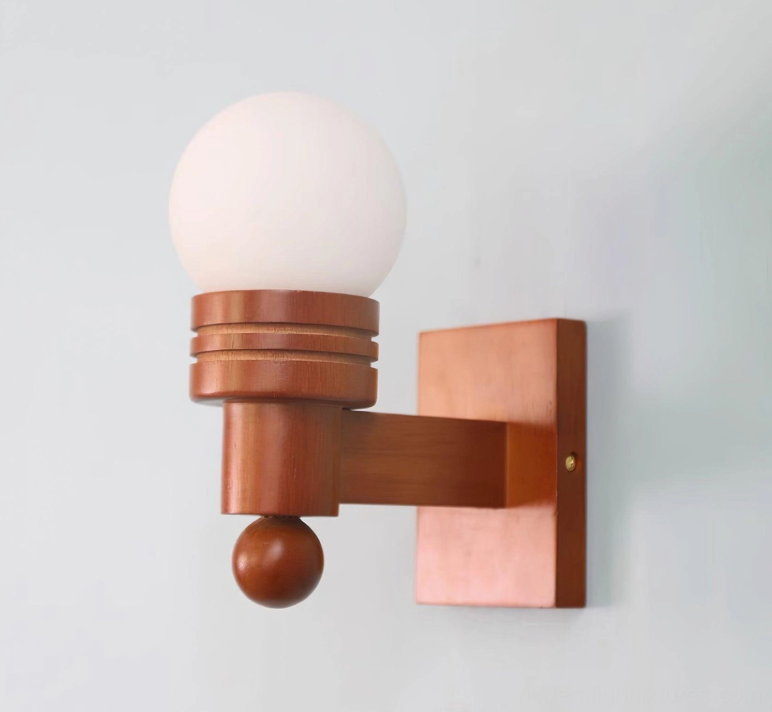 Tupelo wall sconce showcasing Scandinavian design influence and contemporary minimalist style integration