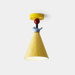 Tweetie bird ceramic ceiling lamp with yellow textured cone shade and blue bird ornament on white background