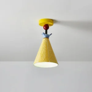 Illuminated Tweetie ceiling lamp fixture showing warm yellow light diffusion with ceramic bird decoration